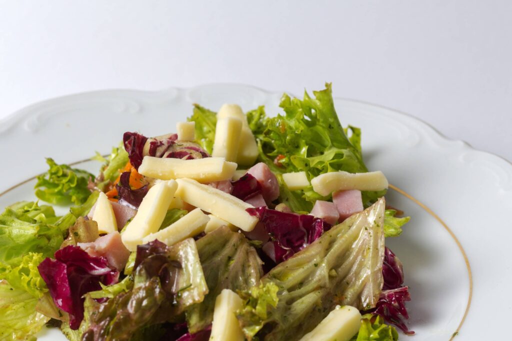 Salade verte au siglino et vinaigrette à l’orange